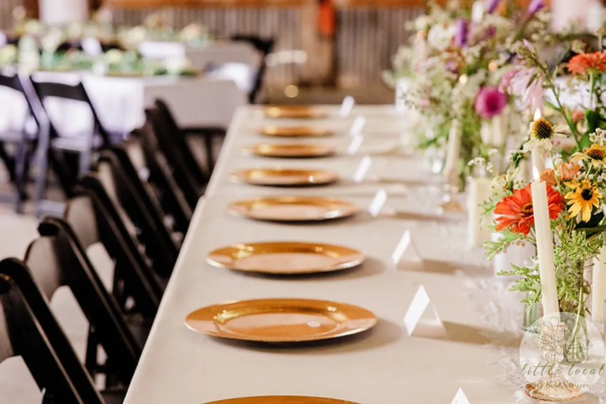 Wedding centerpieces with seasonal flowers on reception tables